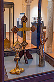 Reliquaries in the Museum of the Duomo of Ravello, Italy. L-R: Reliquary of St. Lorenzo in the shape of a monstrance, circa 1471; Cross Reliquary, circa 16th Century; Reliquary of St. Thomas in the shape of an arm, circa 15th Century A.D.