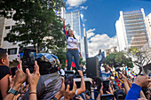 The leader of the opposition Maria Corina Machado, appears at the rally of the opposition called by her, in the streets of Caracas.