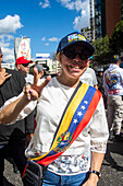 Supporters of Nicolas Maduro's government celebrate on their platforms, prior to the presidential swearing-in on January 10, 2025.