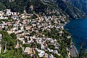 The seaside resort town of Positano terraced on the steep hillside of the Amalfi Coast in Italy.