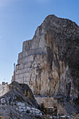 Step wall of an active marble quarry seen during the quarry tour in Fantiscritti. Carrara, Italy.