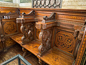 Carved wooden stalls with inlaid wood designs in the Magi Chapel in the Palazzo Medici Riccardi in Florence, Italy.