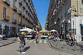 Markets on the street of apartment buildings by Piazza Garibaldi and the main train station in Naples, Italy.