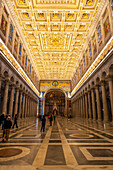 The central nave and triumphal arch in the Basilica of St. Paul Outside the Walls, Rome, Italy.