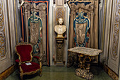 A Florentine mosaic table, Roman bust and Flemish tapestries in the Palazzo Medici Riccardi, Florence, Italy.