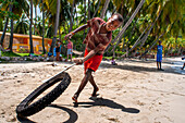 Local children playing in the plage de Ti Mouillage beach in Cayes-de-Jacmel, Cayes de Jacmel, Jacmel, Haiti.