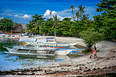 Traditional boats moored in Logon beach, Malapascua island, Cebu, Philippines