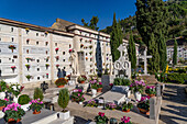 Flowers decorate the graves in a cemetery in Anacapri on the island of Capri, Italy.