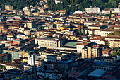 A view over the historic center of the city of Carrara, Italy. At left center is the Casa del Balilla.