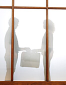 Silhouette of Business People With Briefcase