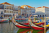 Traditional moliceiro boats on Aveiro main water canal, Aveiro, Portugal, Europe