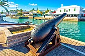 Historic cannon preserved on the waterfront at St. George, the original capital of Bermuda.