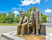 The bronze sculpture by Ludwig Engelhardt of Marx on left and Engels in Marx-Engels Forum in central Berlin, Germany