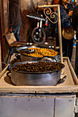 Street food stand of beans and chickpeas in the market street of Marrakesh, Morroco