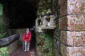 Shrine at entrance to levada tunnel (aqueduct) around Rabacal, Paul da Serra plateau, Madeira island, Atlantic Ocean, Portugal