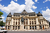 Central University Library of Bucharest and equestrian statue of Carol I, Revolution Square, Bucharest, Romania