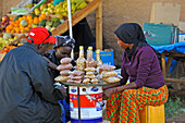 Street vendor of grilled peanuts, Dakar, Senegal, West Africa