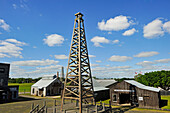 Oil derrick and buldings from Spindletop boomtown period, Spindletop-Gladys City Boomtown Museum, Beaumont, Texas, United States of America