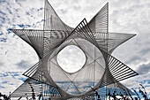 Stainless steel sculpture Ouverture au Monde by artist Angel Duarte, Osche pier in Ouchy, Lake Leman, Lausanne, Canton of Vaud, Switzerland