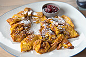 Meal (Frittata dolce) served at Mountain refuge Pian di Cengia (Bullelejochhutte), Three Peaks Nature Park, South Tyrol (Alto Adige), Italy