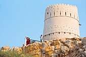 Fort tower at the mouth of the Wadi Shab, canyon near Tiwi, of Oman, Arabian Peninsula