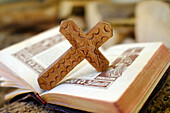 Religious symbol of old Roman Missal with a wooden cross, France