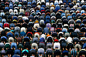 Al Akbar Surabaya National Mosque, Muslim men praying together at Friday prayer, Surabaya, Java, Indonesia