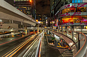 View of buildings and trail lights around Shibuya Station area at night, Shibuya District, Kamiyamacho, Shibuya City, Tokyo, Honshu, Japan