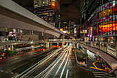 View of buildings and trail lights around Shibuya Station area at night, Shibuya District, Kamiyamacho, Shibuya City, Tokyo, Honshu, Japan