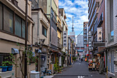 Colourful shops and buildings with Tokyo Skytree in background, Asakusa, Taito City, Tokyo, Honshu, Japan