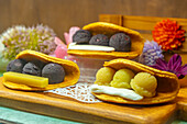 View of traditional Japanese sweets in shop window, Asakusa, Taito City, Tokyo, Honshu, Japan