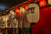 View of colourful lanterns outside of restaurants in Asakusa at night, Asakusa, Taito City, Tokyo, Honshu, Japan