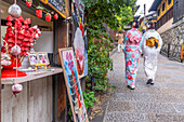 View of ladies in Kimonos in the street in Gion, Kyoto Geisha District, Kyoto, Honshu, Japan