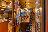 View of restaurant in Dotonbori, vibrant entertainment district near the river, Osaka, Honshu, Japan