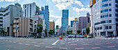 View of street scene and temple in the Shinsekai area, Osaka, Honshu, Japan