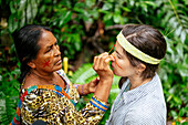 Face painting ritual, Sinchi Warmi, Amazonia, Napo Province, Ecuador