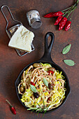 Cacio e Pepe spaghetti with leek, olives and pecorino
