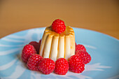 Cr�me caramel with fresh raspberries