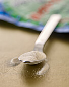 Agar-agar powder on a spoon