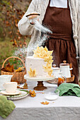 Autumn cake with white chocolate leaves