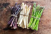 Purple, white and green asparagus