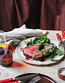 Grilled porcini mushroom fillet of beef with vegetables and black garlic