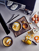 Egg whites on vanilla cream with candied lemon