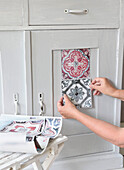 PVC mosaic stickers to embellish a chest of drawers