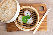 Cantonese har gow dumplings in a steam basket