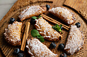 Empanadillas with blueberry filling and cinnamon