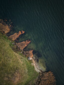 Aerial view of Elektrenu marios artificial lake with serene blue water and lush green shoreline,Elektrenai,Lithuania