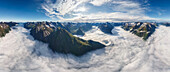 Aerial view of mountain chain above the clouds,Norway