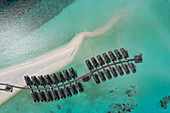 Aerial view of bungalows of a luxury resort along Moofushi Reef,Alif Alif Atoll,Maldives archipelagos