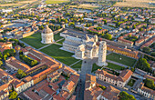 Aerial view of leaning tower of Pisa at sunrise in Italy